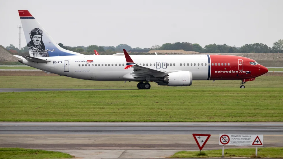 Ett Boeing 737 Max 8 flygplan (med Charles Lindbergh på stjärtfenan) tillhörande Norwegian lyfter från Köpenhamns flygplats. Arkivbild.