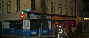 Brand i Pizzerian
Queens Corner