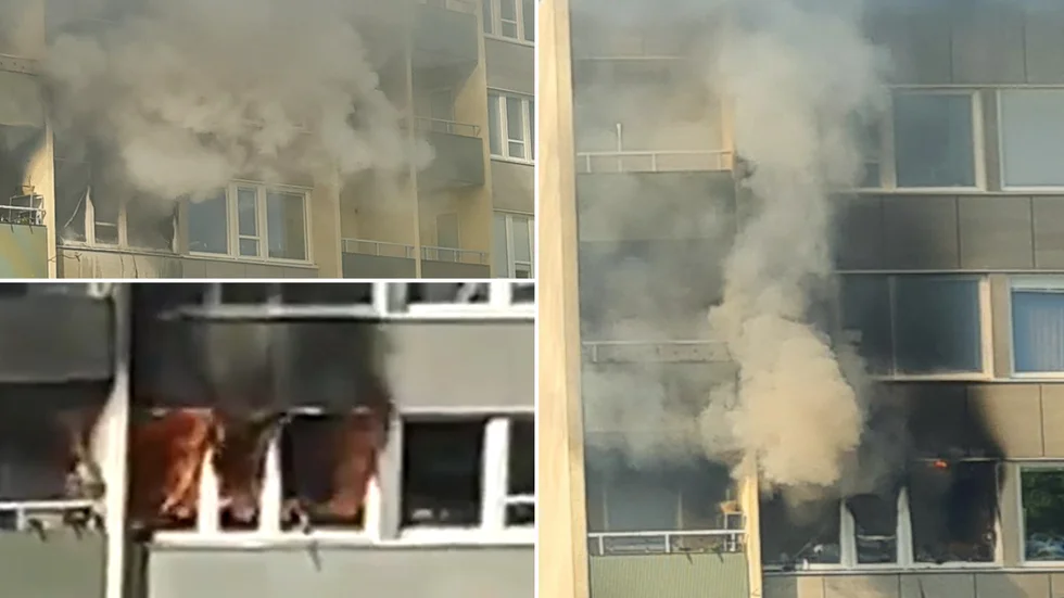 Öppna lågor – och kraftig rök – slog ut från lägenheten.