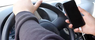 Böter för mobil i handen