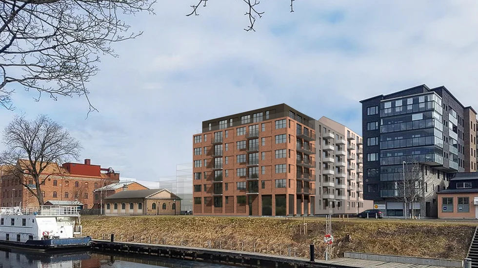 Nya bostadshus byggs i det gamla kvarnområdet öster om Fyrisån. Flera av de äldre tegelhusen intill ska bevaras. 