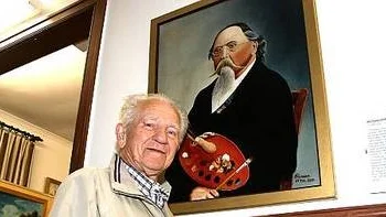 Rune Forsberg vid en reprografi med Olof Krans självporträtt.