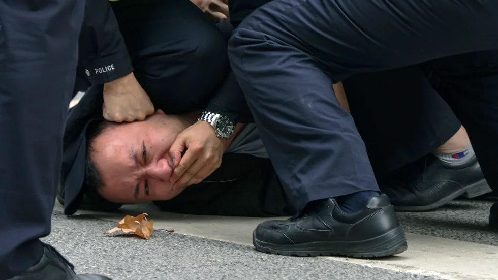 Protester mot Kinas hårdföra covidstrategi.