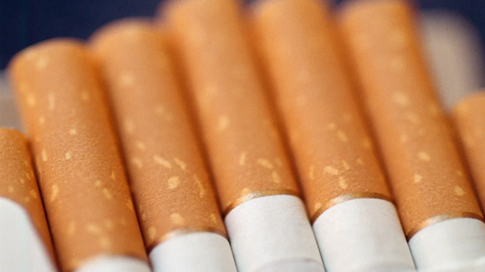 Den åtalade 38-åringen påstår sig ha varit ovetande om att han hade 200 000 cigaretter i bilen.