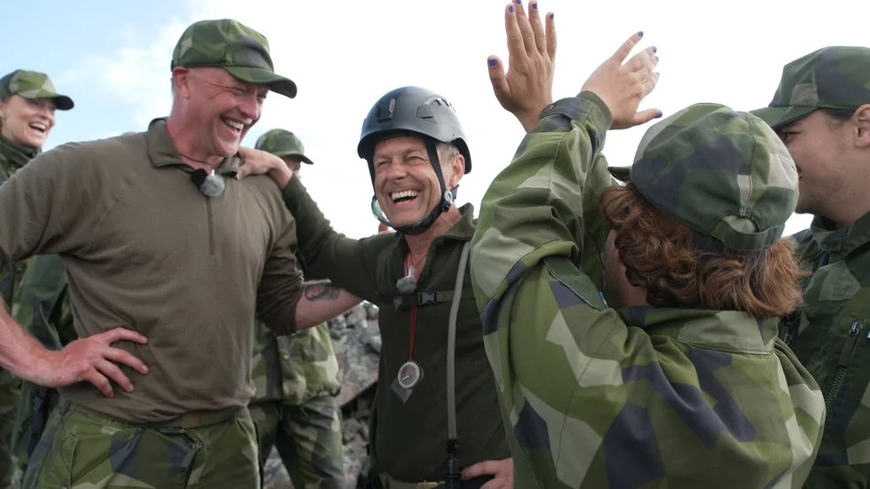 Niclas Wahlgren vinner "Kompani Svan" efter att ha klättrat snabbast uppför en fjälltopp. Pressbild.