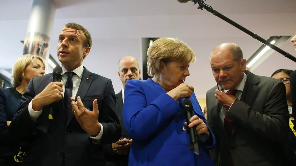 Europas främsta drivkrafter? Frankrikes president Emmanuel Macron (tv), samt Angela Merkel (CDU) och Olaf Scholz (SPÖ), regeringschef respektive finansminister om den stora koalitionen i Tyskland ombildas och fortsätter.