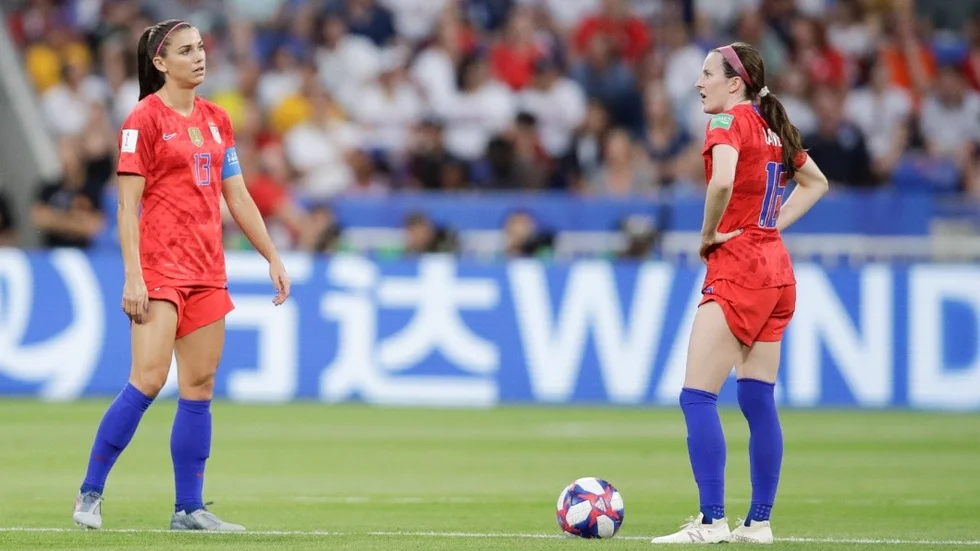 United States' Alex Morgan, right, and United States' Rose Lavelle are dejected after England scored an equalizer during the Women's World Cup semifinal soccer match between England and the United States, at the Stade de Lyon, outside Lyon, France, Tuesday, July 2, 2019. (AP Photo/Alessandra Tarantino)