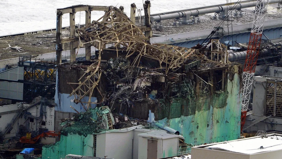 CORRECTS NAME OF POWER PLANT - Severely damaged reactor Unit 3 is seen at the tsunami-crippled Fukushima Dai-ichi nuclear power plant in Okuma, Fukushima Prefecture, Japan, Sunday, March 11, 2012. Japan on Sunday was remembering the massive earthquake and tsunami that struck the nation a year ago, killing just over 19,000 people and unleashing the world's worst nuclear crisis in a quarter century. (AP Photo/Kyodo News) JAPAN OUT, MANDATORY CREDIT, NO LICENSING IN CHINA, HONG KONG, JAPAN, SOUTH KOREA AND FRANCE