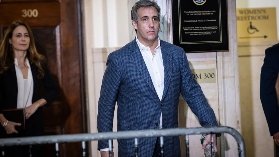 Donald Trumps förre advokat och fixare Michael Cohen när han lämnade rättssalen i New York i tisdags.