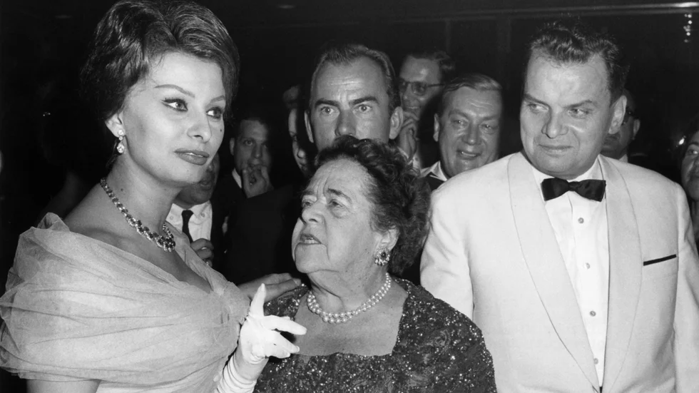 Skådespelaren Sophia Loren, journalisten Elsa Maxwell och Alfred Bauer i juli 1959. En utredning slår nu fast att Bauer före sin tid som chef för Berlins filmfestival hade ett nära samarbete med nazisterna. Arkivbild.