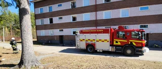 Larm om brand i flerfamiljshus