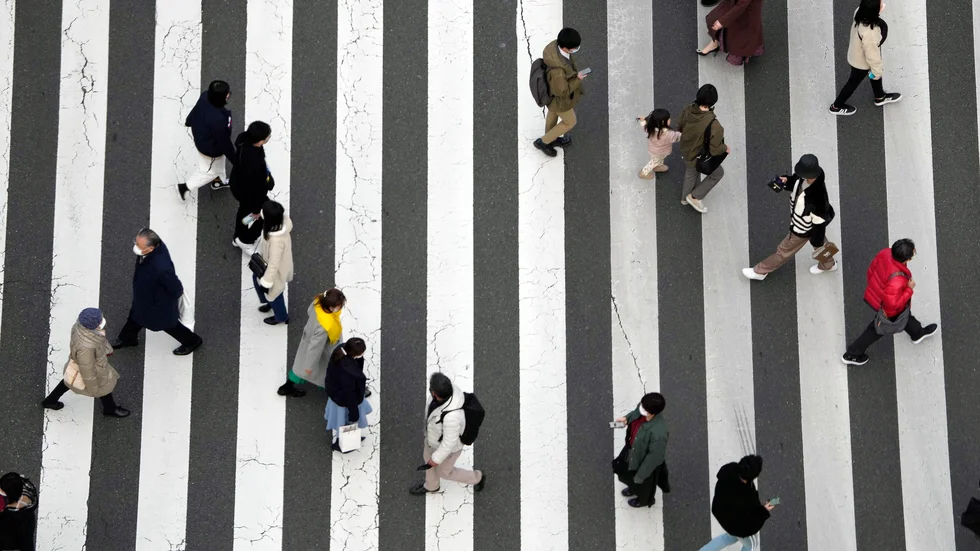 Tokyobor med munskydd. Arkivbild.