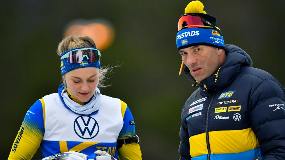 Stina Nilsson och skyttetränaren Jean-Marc Chabloz.