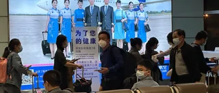 Utländska besökare släpps åter in i Kina