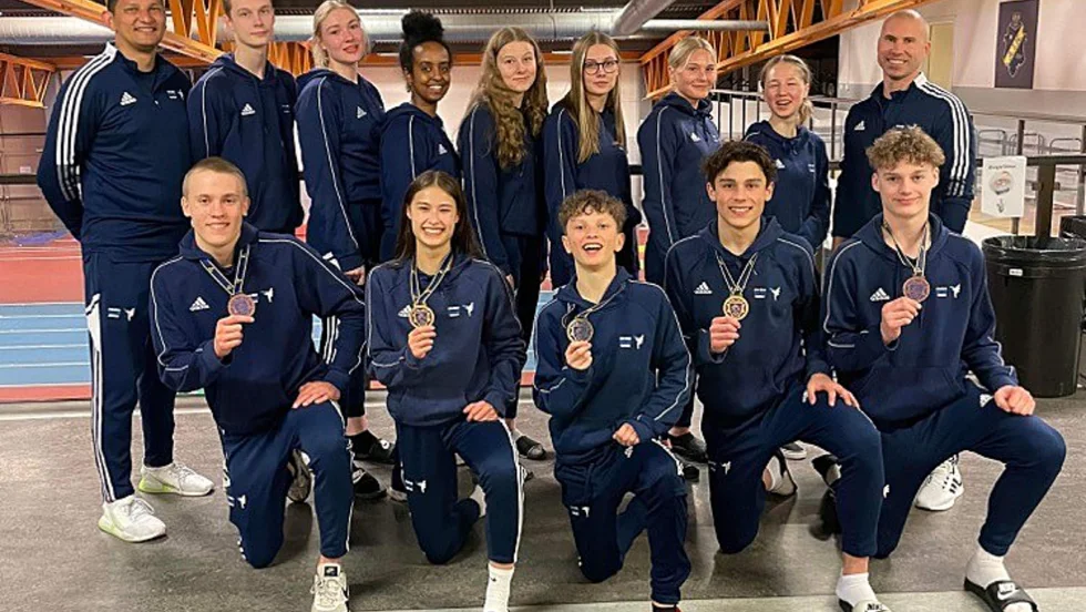 Soo Shims elitlag med medaljörerna längst fram.