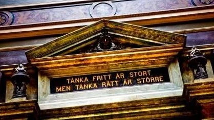 Universitetsmotto som är ifrågasatt.