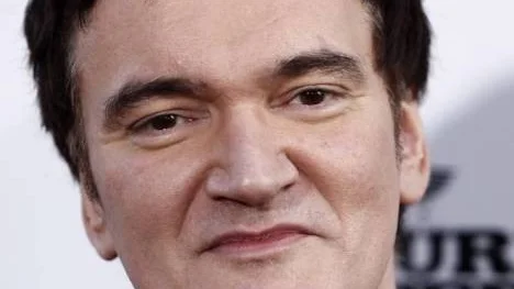 Director Quentin Tarantino arrives at the premiere of "Inglourious Basterds" in Los Angeles on Monday, Aug. 10, 2009.  (AP Photo/Matt Sayles)