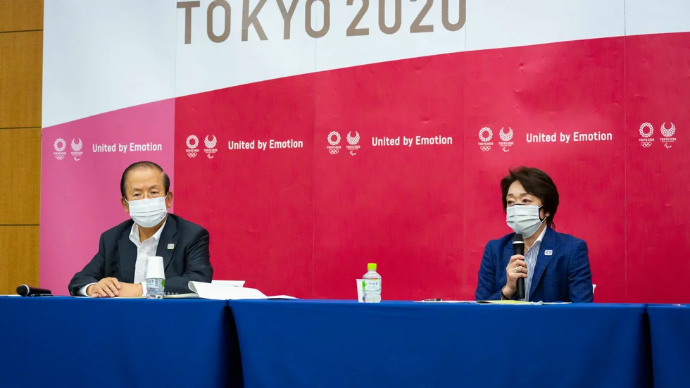 Toshiro Muto och Seiko Hashimoto från OS-arrangöran i Tokyo vid en pressträff i juni.