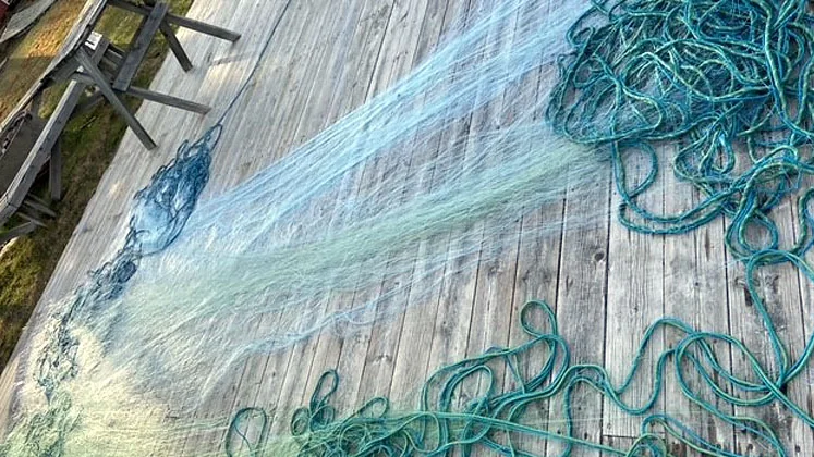 Två personer åtalas för brott mot fiskelagen.