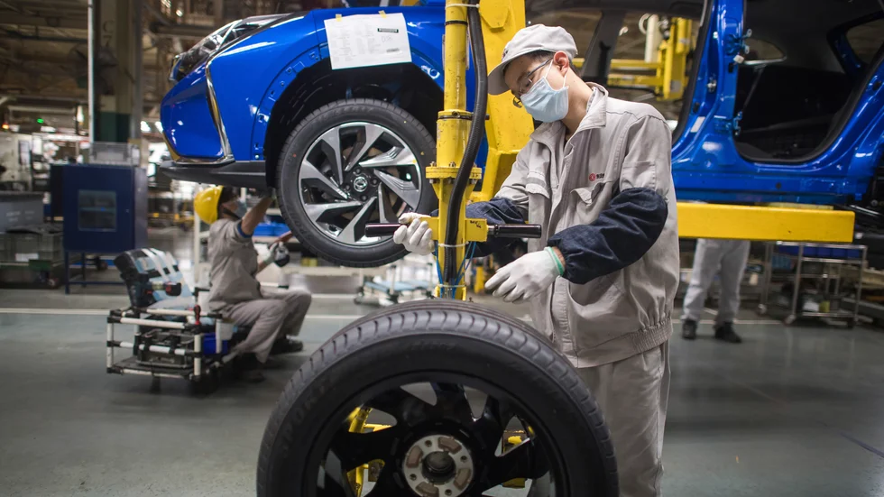 Kinas industri gör vinst igen. På bilden bilmontering i Wuhan i mars.