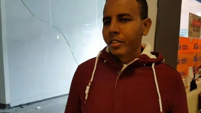 Hassan Mohammed är arg, ledsen och bevsiken efter inbtrottet i hans kioskbutik.