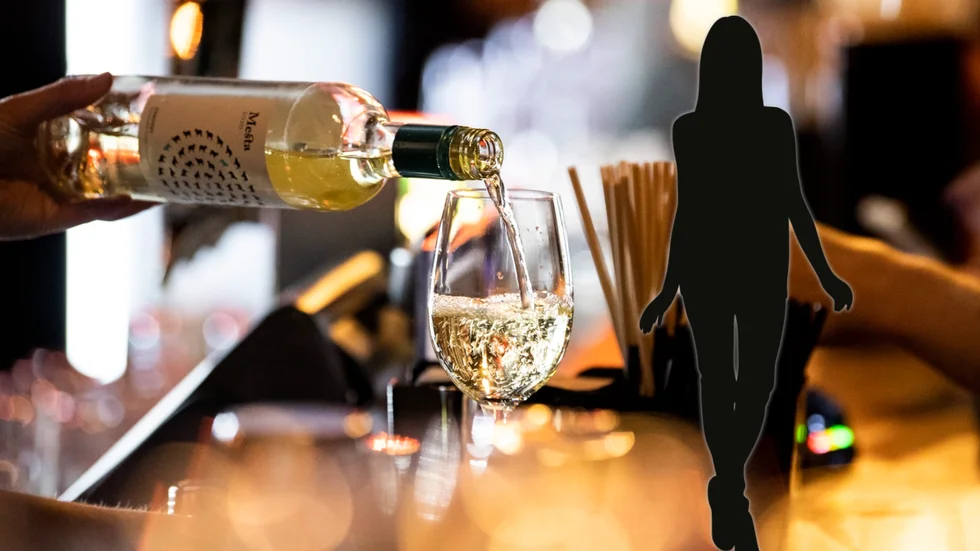 En kvinna misstänks ha stulit alkohol från en krog.