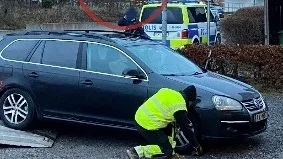 Mannens bil som beslagtogs efter gripandet.