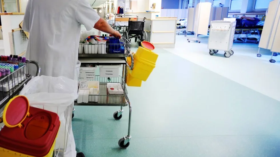 Medarbetaren på bilden har ingenting med artikeln att göra.