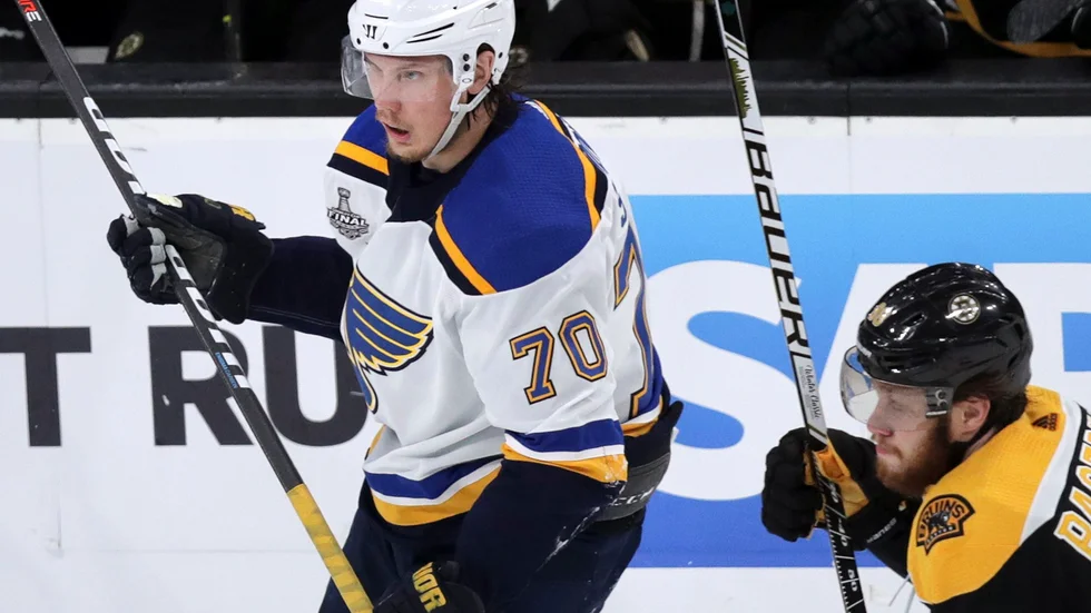 St. Louis Blues' Oskar Sundqvist (70), of Sweden, skates beside Boston Bruins' David Pastrnak (88), of the Czech Republic, during the second period in Game 2 of the NHL hockey Stanley Cup Final, Wednesday, May 29, 2019, in Boston. Sundqvist is facing a potential suspension after delivering a blow to the head of Bruins defenseman Matt Grzelcyk earlier in the game. Bruins coach Bruce Cassidy said Grzelcyk was in the NHL's concussion protocol and listed as day-to-day. (AP Photo/Charles Krupa)