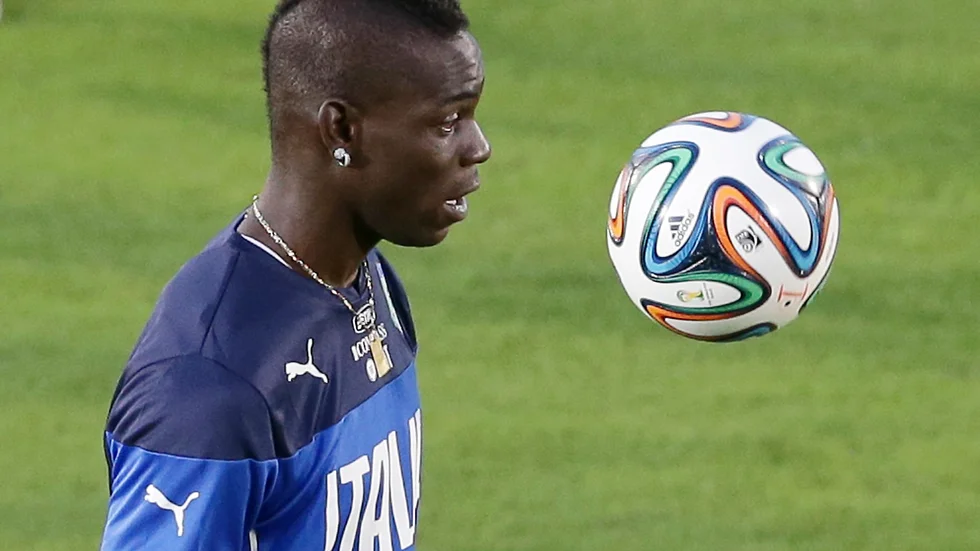 Italy's Mario Balotelli controls the ball during a training session of the Italian national soccer team in Natal, Brazil, Saturday, June 21, 2014. Italy proved ineffective in a 1-0 loss to Costa Rica on Friday and now the Azzurri need a win or a draw against Uruguay on Tuesday to reach the second round of the World Cup. (AP Photo/Antonio Calanni)