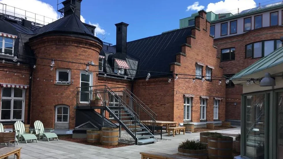 Övre delen av Spritpalatset från1904 innehåller redan idag bostäder med takterass på Forumgallerian.