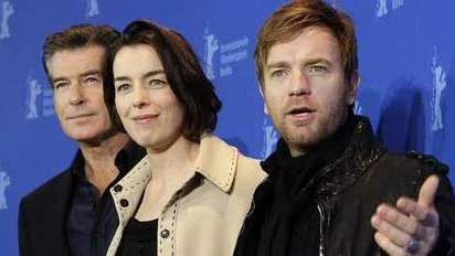 Irish actor Pierce Brosnan and British actors Olivia Williams and Ewan Mcgregor pose at the photo call for the film 'The Ghost Writer' at the International Film Festival Berlinale in Berlin, Germany, Friday, Feb. 12, 2010. The film's director, Roman Polanski, is absent from the festival as he remains under house arrest at his chalet in Switzerland. (AP Photo/Joel Ryan )