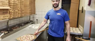 Pizzerian lockar folk från andra byar