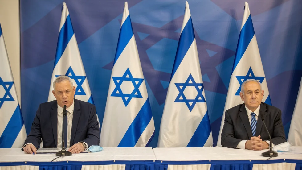 Israels premiärminister Benjamin Netanyahu, till höger, och försvarsminister Benny Gantz under en presskonferens i Tel Aviv i juli.