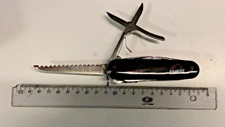 En tonåring misstänks för brott mot knivlagen efter att på offentlig plats burit ett multiverktyg med knivar i.